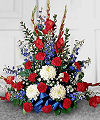 
This striking arrangement is a beautiful study in contrasts, setting fiery red against pristine white and bold blues...
			