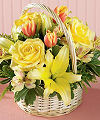
This round willow basket is filled with posies that look freshly picked from your garden...
			