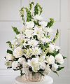 
A round willow basket holds pure white flowers as a symbol of light...
			
