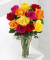 
This spirited bouquet holds roses in bold hues - hot pink, orange, red and bright yellow...
			
