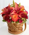 
This fall basket is bejeweled in Autumn's most majestic hues creating an arrangement of blooming beauty...
			
