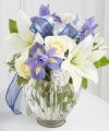 
Celebrate this miraculous and meaningful holiday with an abundance of beautiful blooms...
			
