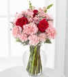 
Put your heart in her hands with this soft display of romantic blooms...
			