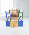 
Ghirardelli's Blissful Treats is filled with a trove of their finest chocolates in this gift box, all wrapped up with a gold bow...
			