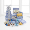 
Let It Snow! Warm up the season with co-workers and friends with this snowy sweets and treats tower...
			
